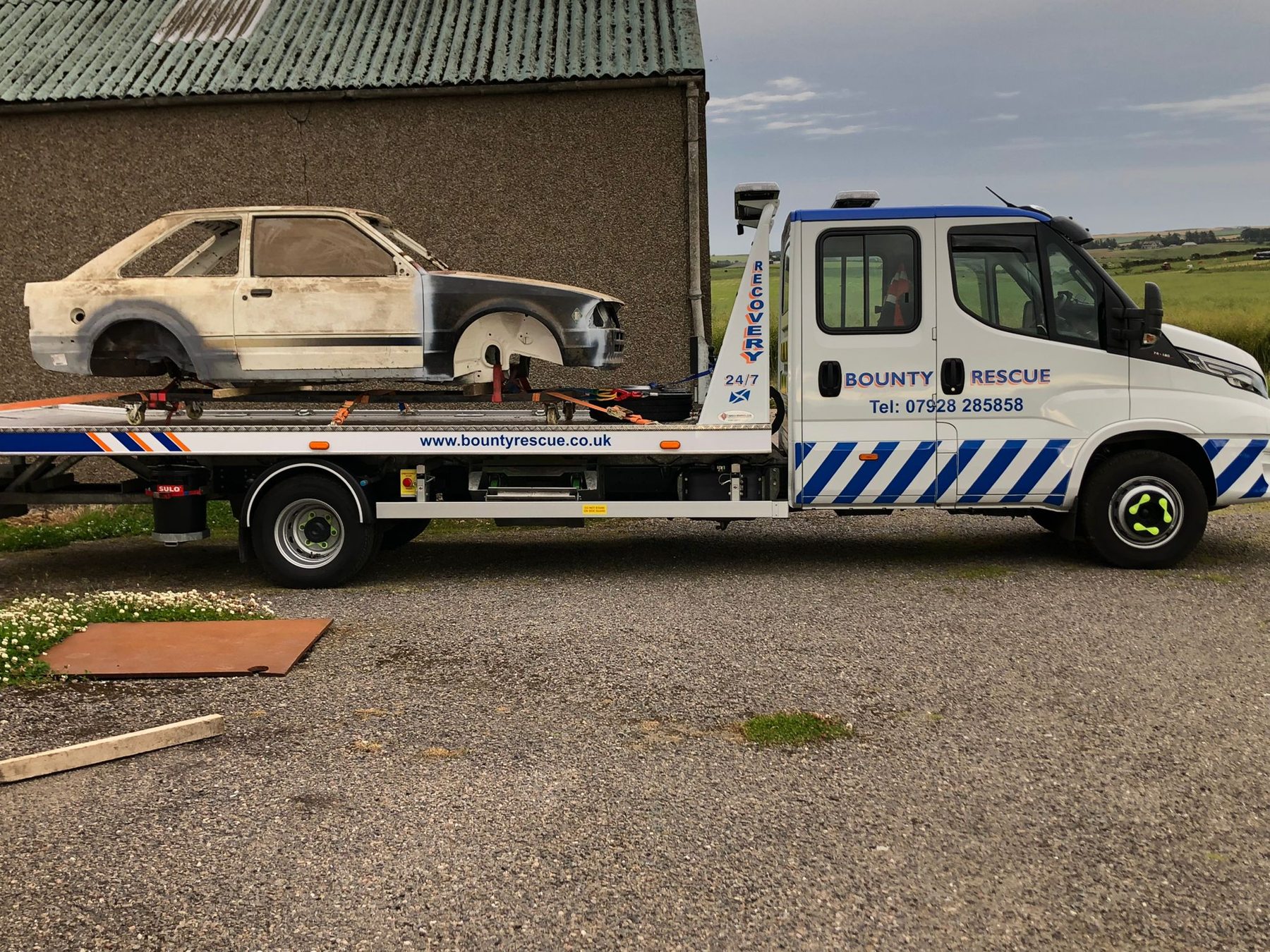 Bounty Rescue recovery truck transporting a vehicle